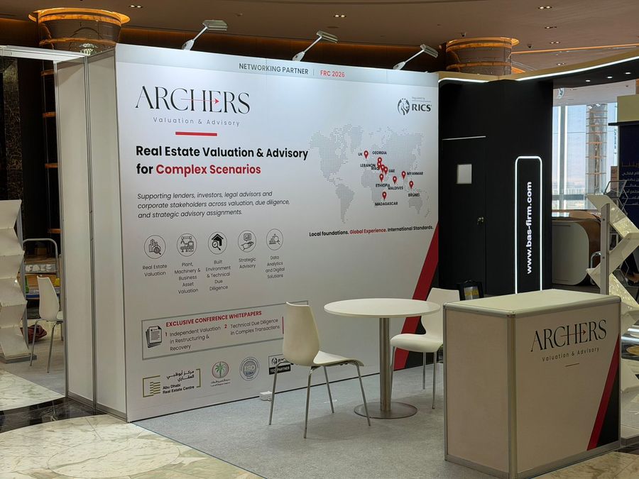 The Archers stand at the Financial Restructuring MENA Conference 2026 in Abu Dhabi, with its welcome desk and meeting table
